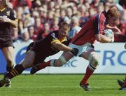 25 April 2004; Paul O'Connell of Munster is tackled by Richard Birkett of London Wasps during the Heineken Cup Semi-Final match between Munster and London Wasps at Lansdowne Road in Dublin. Photo by Brendan Moran/Sportsfile