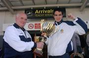 25 April 2004; Republic of Ireland U18 captain Joey O'Brien, right, and coach Noel O'Reilly are pictured at Dublin Airport in Dublin, upon their return following their side's victory in the 2004 U18 International Tournament of Viseu, in Viseu, Portugal. Photo by David Maher/Sportsfile