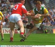 7 May 2000; James Brady of Offaly in action against Mark Stanfield of Louth during the Church & General National Football League Division 2 Final between Louth and Offaly at Croke Park in Dublin. Photo by Ray Lohan/Sportsfile