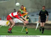 14 May 1995. Donegal's Martin Shovlin gets his shot in despite the challenge of Derry's Dermot Heaney. National Football League Final, Derry v Donegal, Croke Park, Dublin. Picture credit; David Maher/SPORTSFILE