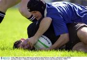 13 May 2000. Simon Mason, Ballymena is tackled by John McWeeney, St Mary's. All-Ireland League Rugby semi-final, St Mary's v Ballymens, Templeville Road, Dublin. Picture credit; Brendan Moran...*(EDI)*
