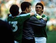 25 June 1990; Tony Cascarino of Republic of Ireland, right, celebrates with team-mates Packie Bonner, centre, and Andy Townsend following of the FIFA World Cup 1990 Round of 16 match between Republic of Ireland and Romania at the Stadio Luigi Ferraris in Genoa, Italy. Photo by Ray McManus/Sportsfile