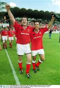 6 May 2000. Munster Anthony Foley, left, and Mike Mullins celebrate victory over Toulouse. European Rugby Cup semi-final, Toulouse v Munster, Stade Lescure, Bordeaux, France. Picture credit; Brendan Moran/SPORTSFILE