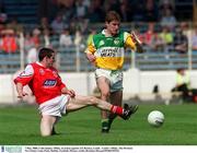 7 May 2000; Colm Quinn of Offaly in action against J.P. Rooney of Louth during the Church & General National Football League Division 2 Final between Louth and Offaly at Croke Park in Dublin. Photo by Brendan Moran/Sportsfile