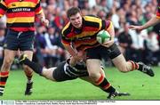 14 May 2000; Lansdowne's Gordon D'Arcy is tackled by Robert Dolan, Terenure AIB Rugby League Semi Final Terenure v Lansdowne, Lakelands Park, Dublin. Picture credit Matt Browne/SPORTSFILE