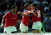 6 May 2000; Munster's Jason Holland, centre is congratulated on scoring his sides 3rd try by team-mates Ronan O'Gara, 10, and Mike Mullins against Toulouse. European Rugby Cup semi-final, Toulouse v Munster, Stade Lescure, Bordeaux, France. Picture credit; Brendan Moran/SPORTSFILE