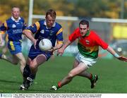 7 May 2000. Kevin O'Brien, Wicklow gets away from carlow's Sean Kavanagh. Bank of Ireland Leinster Football Championship, Wicklow v Carlow, County Park, Aughrim. Football. Picture credit; Matt Browne/SPORTSFILE