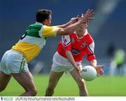7 May 2000; Nicky Malone of Louth in action against Sean Grennan of Offaly during the Church & General National Football League Division 2 Final between Louth and Offaly at Croke Park in Dublin. Photo by Ray McManus/Sportsfile