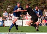 13 May 2000. Victor Costello, St Mary's is tackled by Mark Edwards,  Ballymena. All-Ireland League Rugby semi-final, St Mary's v Ballymena, Templeville Road, Dublin. Picture creditl; Matt Browne/SPORTSFILE