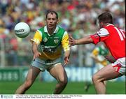 7 May 2000; Finbar Cullen of Offaly in action against Mark Stanfield of Louth during the Church & General National Football League Division 2 Final between Louth and Offaly at Croke Park in Dublin. Photo by Brendan Moran/Sportsfile