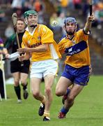 30 June 2007; Paul Shields, Antrim, in action against James McInerney, Clare. Guinness All-Ireland Hurling Championship Qualifier, Group 1A, Round 1, Antrim v Clare, Casement Park, Belfast, Co. Antrim. Picture credit: Oliver McVeigh / SPORTSFILE