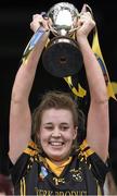 1 March 2015; The Piltown captain Laura Norris lifts the cup. AIB All Ireland Intermediate Club Camogie Final, Piltown v Lismore. Croke Park, Dublin. Picture credit: Ray McManus / SPORTSFILE