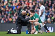 1 March 2015; Cian Healy, Ireland, is attended to by team doctor Dr. Eanna Falvey following a clash of heads with England's Dan Cole. RBS Six Nations Rugby Championship, Ireland v England. Aviva Stadium, Lansdowne Road, Dublin. Picture credit: Brendan Moran / SPORTSFILE