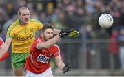 1 March 2015; Eoin Cadogan, Cork, in action against Neil Gallagher, Donegal. Allianz Football League, Division 1, Round 3, Donegal v Cork. Fr Tierney Park, Ballyshannon, Co. Donegal. Picture credit: Oliver McVeigh / SPORTSFILE