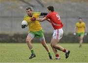 1 March 2015; Christy Toye, Donegal, in action against Mark Collins, Cork. Allianz Football League, Division 1, Round 3, Donegal v Cork. Fr Tierney Park, Ballyshannon, Co. Donegal. Picture credit: Oliver McVeigh / SPORTSFILE