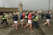 1 March 2015; The Cork squad make their way back across the road after the warm up. Allianz Football League, Division 1, Round 3, Donegal v Cork. Fr Tierney Park, Ballyshannon, Co. Donegal. Picture credit: Oliver McVeigh / SPORTSFILE