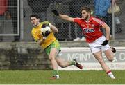 1 March 2015; Ryan McHugh, Donegal, in action against Eoin Cadogan, Cork. Allianz Football League, Division 1, Round 3, Donegal v Cork. Fr Tierney Park, Ballyshannon, Co. Donegal. Picture credit: Oliver McVeigh / SPORTSFILE