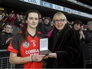 1 March 2015; Stacey Redmond, of Oulart-The Ballagh, receives the Player of the Match award from Maol Muire Tynan, AIB, at the AIB All-Ireland Senior Camogie Club Championship Final, Mullagh v Oulart The Ballagh, in Croke Park, Dublin. For exclusive content and to see why the AIB Club Championships are #TheToughest follow us @AIB_GAA and on Facebook at facebook.com/AIBGAA. Croke Park, Dublin. Picture credit: Ray McManus / SPORTSFILE