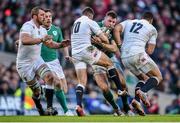 1 March 2015; Robbie Henshaw, Ireland, is tackled by George Ford, centre, and Luther Burrell, England. RBS Six Nations Rugby Championship, Ireland v England. Aviva Stadium, Lansdowne Road, Dublin. Picture credit: Stephen McCarthy / SPORTSFILE