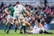 1 March 2015; Robbie Henshaw, Ireland, is tackled by George Kruis, left, and Tom Youngs, England. RBS Six Nations Rugby Championship, Ireland v England. Aviva Stadium, Lansdowne Road, Dublin. Picture credit: Stephen McCarthy / SPORTSFILE