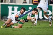 1 March 2015; Tiernan O'Halloran, Connacht, dives over to score his side's first try despite the tackle by Ludovico Nitoglia, Benetton Treviso. Guinness PRO12 Round 16, Connacht v Benetton Treviso, Sportsground, Galway. Picture credit: Ramsey Cardy / SPORTSFILE