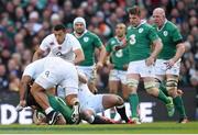 1 March 2015; Sean O'Brien, Ireland, is tackled by Billy Vunipola, left, and George Ford, England, which resulted in O'Brien leaving the field with an injury. RBS Six Nations Rugby Championship, Ireland v England. Aviva Stadium, Lansdowne Road, Dublin. Picture credit: Stephen McCarthy / SPORTSFILE