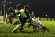 1 March 2015; Danie Poolman, Connacht, scores a try despite the tackle by Ludovico Nitoglia, Benetton Treviso. Guinness PRO12 Round 16, Connacht v Benetton Treviso, Sportsground, Galway. Picture credit: Ramsey Cardy / SPORTSFILE
