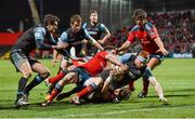 28 February 2015; Connor Braid, Glasgow Warriors, is held up short of the line by Andrew Smith, Munster. Guinness PRO12, Round 16, Munster v Glasgow Warriors. Irish Independent Park, Cork. Picture credit: Matt Browne / SPORTSFILE