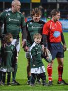 28 February 2015; Ireland Legends Trevor Brennan, left, and Shane Byrne with team mascots and referee Alain Rolland before the game. Ireland legends v England legends.  Donnybrook Stadium, Donnybrook, Dublin. Picture credit: Piaras Ó Mídheach / SPORTSFILE