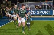 28 February 2015; Mel Deane, Ireland Legends, runs out for the start of the game with a team mascot. Ireland legends v England legends.  Donnybrook Stadium, Donnybrook, Dublin. Picture credit: Piaras Ó Mídheach / SPORTSFILE