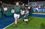 28 February 2015; Ireland Legends captain Shane Byrne and mascot Martin Naughton, aged 7, from Navan RFC, run onto the pitch ahead of the game. Ireland legends v England legends.  Donnybrook Stadium, Donnybrook, Dublin. Picture credit: Piaras Ó Mídheach / SPORTSFILE