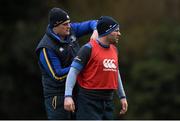 2 March 2015; Leinster's Rhys Ruddock, left, helps Fergus McFadden with his GPS unit during squad training. Leinster Rugby Squad Training, Rosemount, UCD, Dublin. Picture credit: Ramsey Cardy / SPORTSFILE