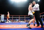 2 Fabruary 2008: Referee Emile Tiedt, holds on to  Alejandro Falliga as Andy Lee looks on after a knockdown during the fifth round. Ladbrokes.com Fight Night, Andy Lee.v.Alejandro Falliga, University Sports Arena, Limerick. Picture credit: David Maher / SPORTSFILE