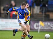 3 February 2008; Wicklow's Dean Odlum scores his side's first goal despite the challenge of Antrim's Tony Scullion. Allianz National Football League, Division 4, Round 1, Wicklow v Antrim, County Park, Aughrim, Co. Wicklow. Picture credit: Pat Murphy / SPORTSFILE *** Local Caption ***