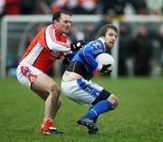 3 February 2008; Michael Lyng, Cavan, in action against Aidan O'Rourke, Armagh. Allianz National Football League, Division 2, Round 1, Armagh v Cavan, St Oliver Plunkett Park, Crossmaglen, Co Armagh. Picture credit: Oliver McVeigh / SPORTSFILE