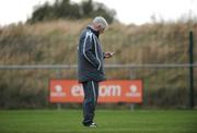 5 February 2008; Republic of Ireland caretaker manager Don Givens looking at his mobile phone during squad training. Gannon Park, Malahide, Co. Dublin. Picture credit: David Maher / SPORTSFILE