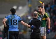 1 March 2015; Referee Eddie Kinsella shows a yellow card to Kerry's Anthony Maher and Dublin's Bernard Brogan. Allianz Football League, Division 1, Round 3, Kerry v Dublin. Fitzgerald Stadium, Killarney, Co. Kerry. Picture credit: Diarmuid Greene / SPORTSFILE