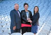 3 March 2015; Erin Treanor, centre, Emyvale, Co. Monaghan, is presented with the TESCO Club Person of the Year Award by LGFA President, Pat Quill, and  TESCO Local Marketing Manager, Lynn Moynihan. The TESCO Club Person of the Year Award recognises the contributions of volunteers in clubs throughout the length and breadth of the country. These unsung heroes are the lifes blood of the game and are fully deserving of the recognition. The four Provincial Club Person of the year winners were selected from a huge amount of nominations and presented with their award at Croke Park on March 3rd. The overall winner was selected from amongst those 4 provincial winners. Croke Park, Dublin. Picture credit: Brendan Moran / SPORTSFILE