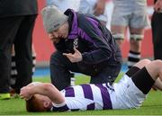 3 March 2015; Donal Mongey, Clongowes Wood College, receives treatment for a head injury. Bank of Ireland Leinster Schools Senior Cup Semi-Final, Clongowes Wood College v Belvedere College, Donnybrook Stadium, Donnybrook, Dublin. Picture credit: Piaras Ó Mídheach / SPORTSFILE