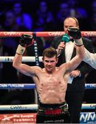 28 February 2015; Paddy Gallagher is announced victorious over Miguel Aguilar during their Welterweight bout. The World Is Not Enough Undercard, Odyssey Arena, Belfast, Co. Antrim. Picture credit: Stephen McCarthy / SPORTSFILE