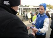 4 March 2015; Niall Behan, a member of the Leinster Rugby Blue Crew, hands out free Leinster Rugby watches to fans before the match. Bank of Ireland Leinster Schools Senior Cup Semi-Final, Cistercian College Roscrea v Newbridge College, Donnybrook Stadium, Donnybrook, Dublin. Picture credit: Cody Glenn / SPORTSFILE