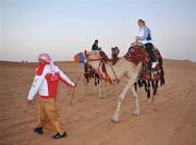 28 January 2008; Kerry footballer Sarah O'Connor tries out some camel rides during a Safari Trip. O'Neills/TG4 Ladies Gaelic Football All Star Tour 2007, Dubai, United Arab Emirates. Picture credit: Brendan Moran / SPORTSFILE  *** Local Caption ***