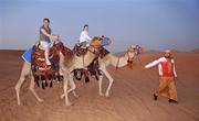 28 January 2008; Tyrone footballers Gemma Begley, left, and Cathy Donnelly try out some camel rides during a Safari Trip. O'Neills/TG4 Ladies Gaelic Football All Star Tour 2007, Dubai, United Arab Emirates. Picture credit: Brendan Moran / SPORTSFILE  *** Local Caption ***