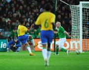6 February 2008; Robson Souza, Brazil, shoots past Lee Carsley, Republic of Ireland to score his side's first goal. International Friendly, Republic of Ireland v Brazil, Croke Park, Dublin. Picture credit; David Maher / SPORTSFILE
