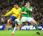 6 February 2008; Luis Fabiano, Brazil, in action against Richard Dunne, Republic of Ireland. International Friendly, Republic of Ireland v Brazil, Croke Park, Dublin. Picture credit; Pat Murphy / SPORTSFILE *** Local Caption ***