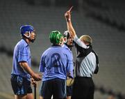 9 February 2008; Padraic Kelly, blue helmet, Moyle Rovers, is shown a red card by referee Pat Green, Galway. All Ireland Junior Club Championship Final, Moyle Rovers, Tipperary v Conahy Shamrocks, Kilkenny, Croke Park, Dublin. Picture credit; Stephen McCarthy / SPORTSFILE