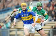 10 February 2008; Pa Burke, Tipperary, in action against Joe Bergin, Offaly. Allianz National Hurling League, Division 1B, Round 1, Tipperary v Offaly, Semple Stadium, Thurles, Co. Tipperary. Picture credit; Stephen McCarthy / SPORTSFILE