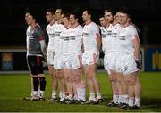 28 February 2015; The Tyrone team stand for the anthem. Allianz Football League, Division 1, Round 3, Tyrone v Derry. Healy Park, Omagh, Co. Tyrone. Picture credit: Oliver McVeigh / SPORTSFILE