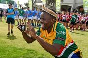 6 March 2015; Tumisang Leacwe, a member of the South Africa team, takes pictures of his team-mates ahead of the tournament. Zayed Sports Stadium, Abu Dhabi, United Arab Emirates. Picture credit: Ray McManus / SPORTSFILE