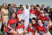 6 March 2015; Uachtarán Chumann Lúthchleas Gael Aogán Ó Feargháil, his wife Frances, and H.E. Sheikh Nahayan Mabarak Al Nahayan, Minister of Culture, Youth and Community Development, with a group of New York players before the games. Zayed Sports Stadium, Abu Dhabi, United Arab Emirates. Picture credit: Ray McManus / SPORTSFILE